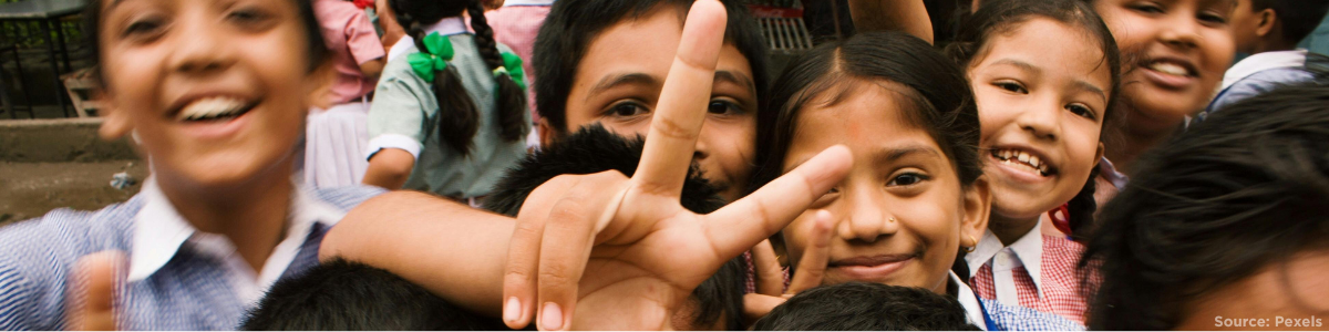 children smiling for the camera